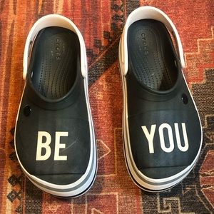 Black and white “Be You” platform Crocs